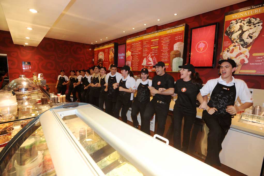 Interior of Cold Stone Creamery and employees in Brazil.
