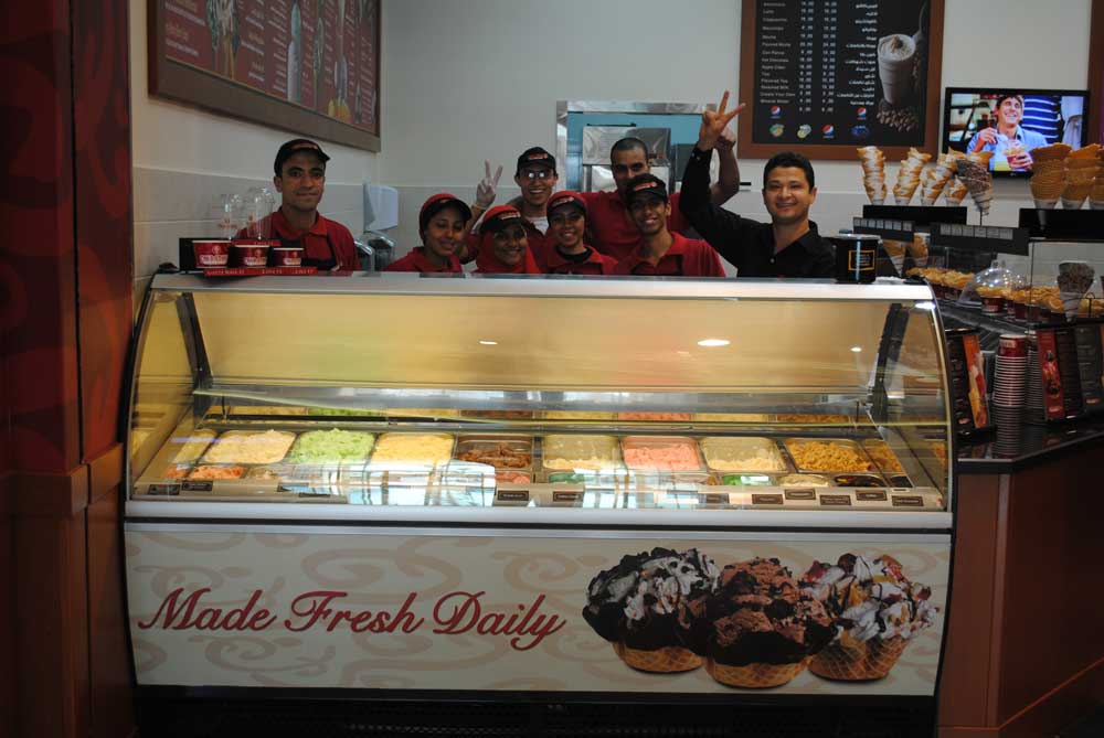 Interior of Cold Stone Creamery  and employees in Egypt.